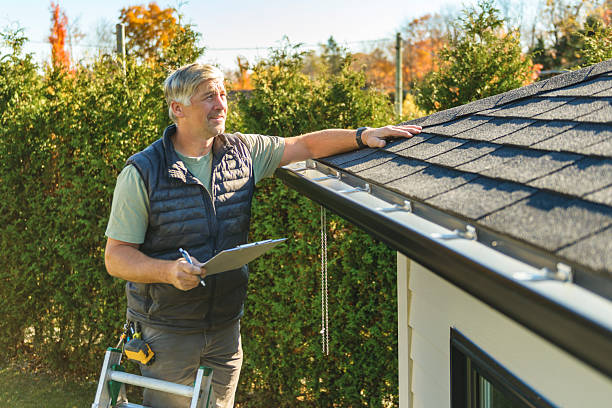 Professional Roofing technician working in Reedley, CA